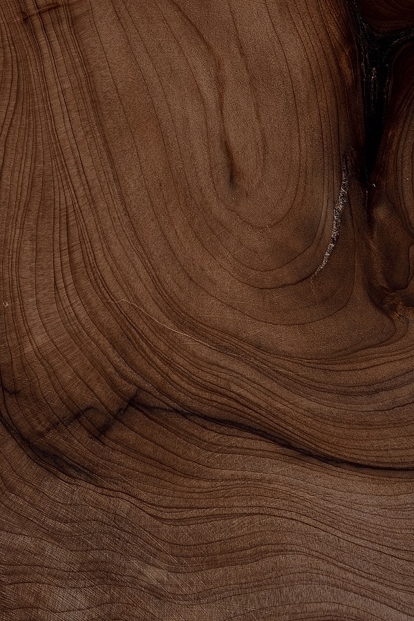 Close-up of smooth, polished wooden surface.
